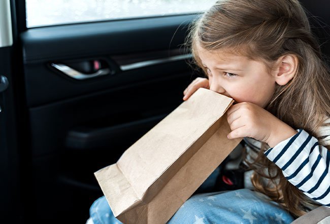 Heat can cause carsick in children